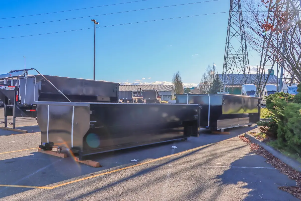 Roll-off dumpster ready for waste disposal at job site for 2 Yard Dumpster Rental in Shelby